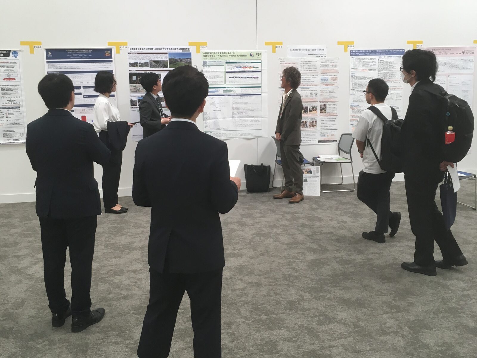 Poster session hall at the 13th Conference of the Japanese Society for Support of Adults with Developmental Disorders, where the Turn Lens poster from the NCNP joint research was presented.